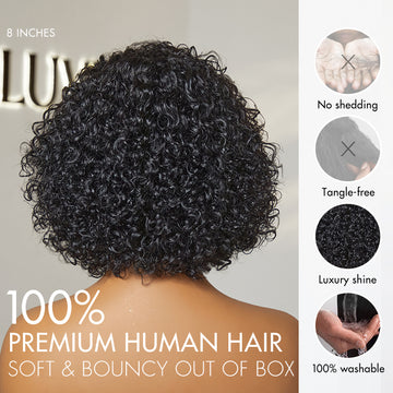 curly wig made of 100% premium human hair, offering a soft, bouncy texture straight out of the box. Features include no shedding, tangle-free strands, luxury shine, and 100% washability.