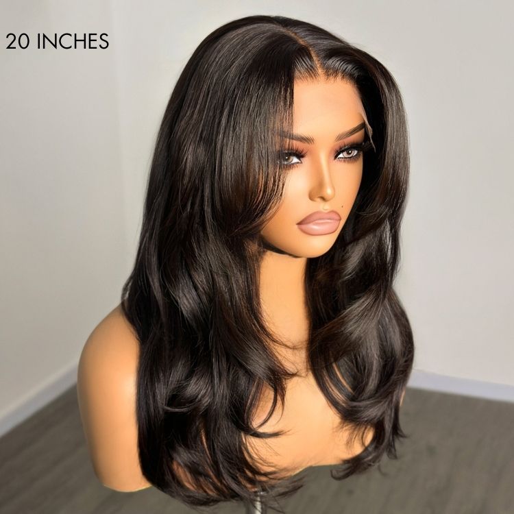 Luvme Hair 5x5 closure wig with layered cut, HD lace, bangs, available in large and small cap sizes, styled with natural hair texture.