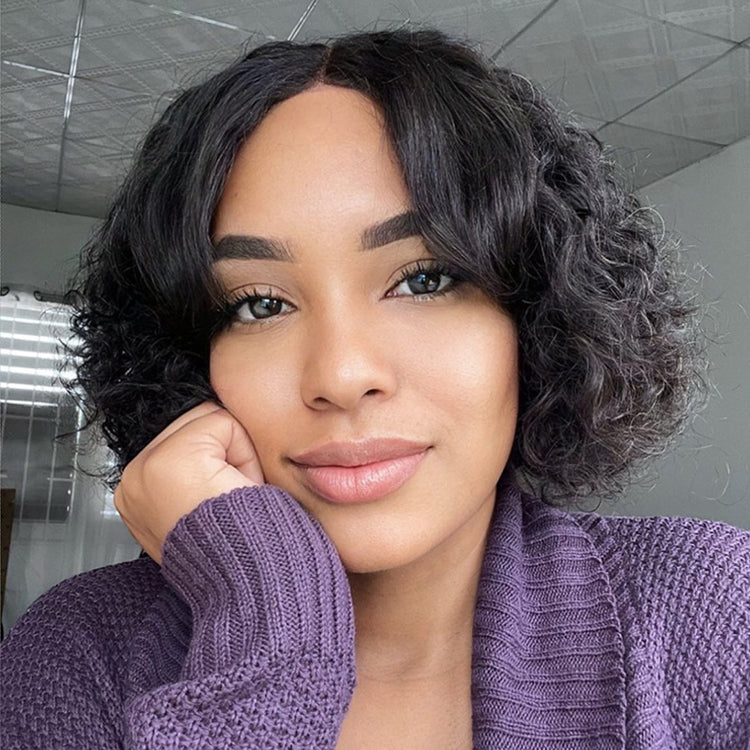 Luvme casual bouncy curly 4x4 closure lace glueless short wig with bangs made of 100% human hair, styled with voluminous curls.
