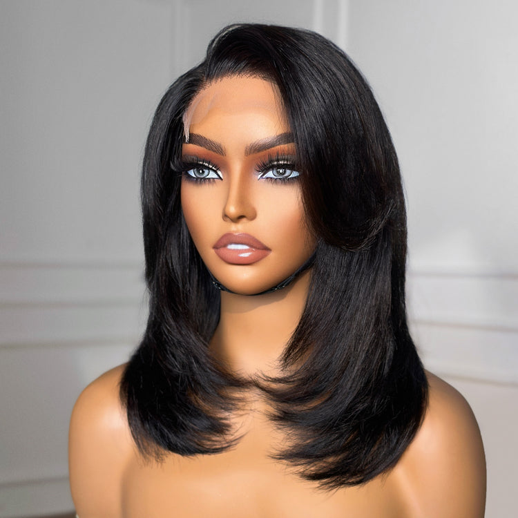 Luvme shaggy layered 4x4 closure wig with side-swept bangs, 100% human hair, showcasing the textured hairstyle and natural color