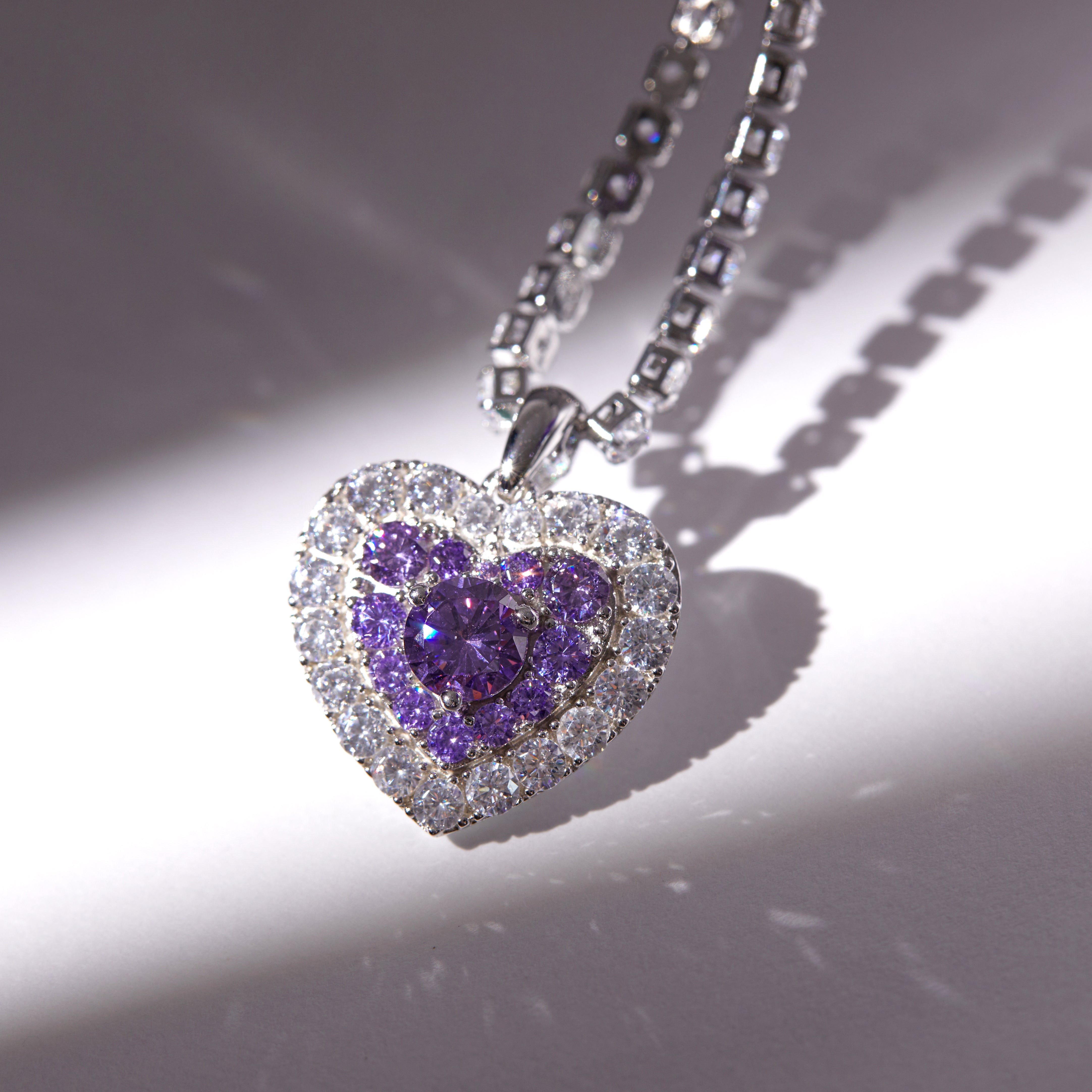 Purple heart necklace from Luvme Hair, featuring a delicate chain and a purple heart pendant, elegant jewelry accessory.