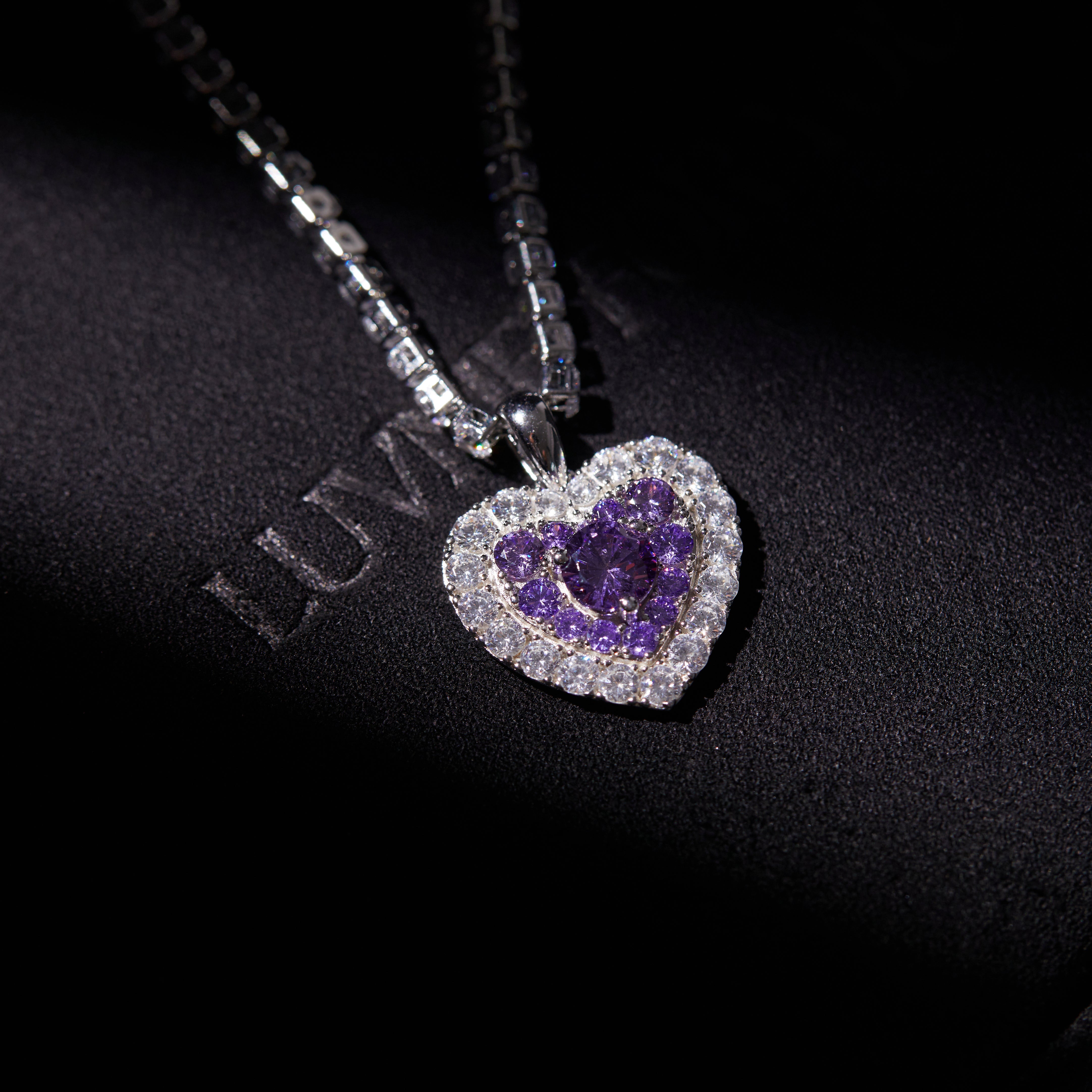 Limited edition purple heart necklace by Luvme Hair featuring a delicate purple heart pendant on a fine chain.