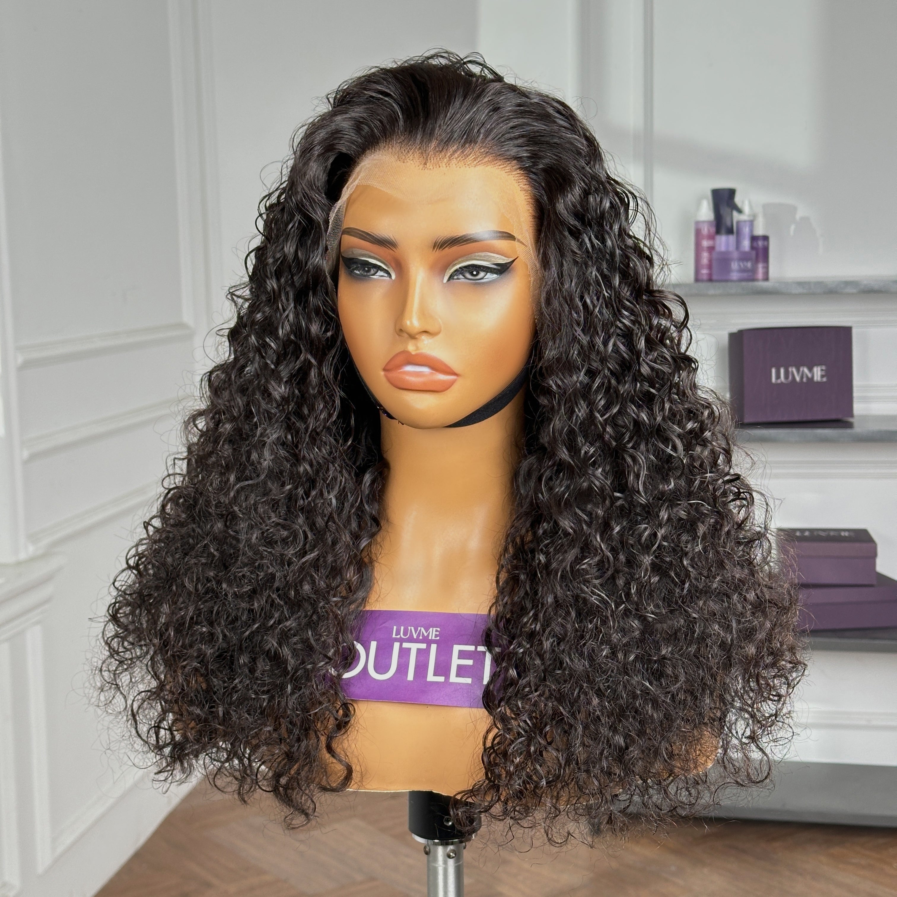 Luvme Hair water wave 13x4 frontal HD lace glueless long curly wig with pre-cut lace and free part, natural and stylish.