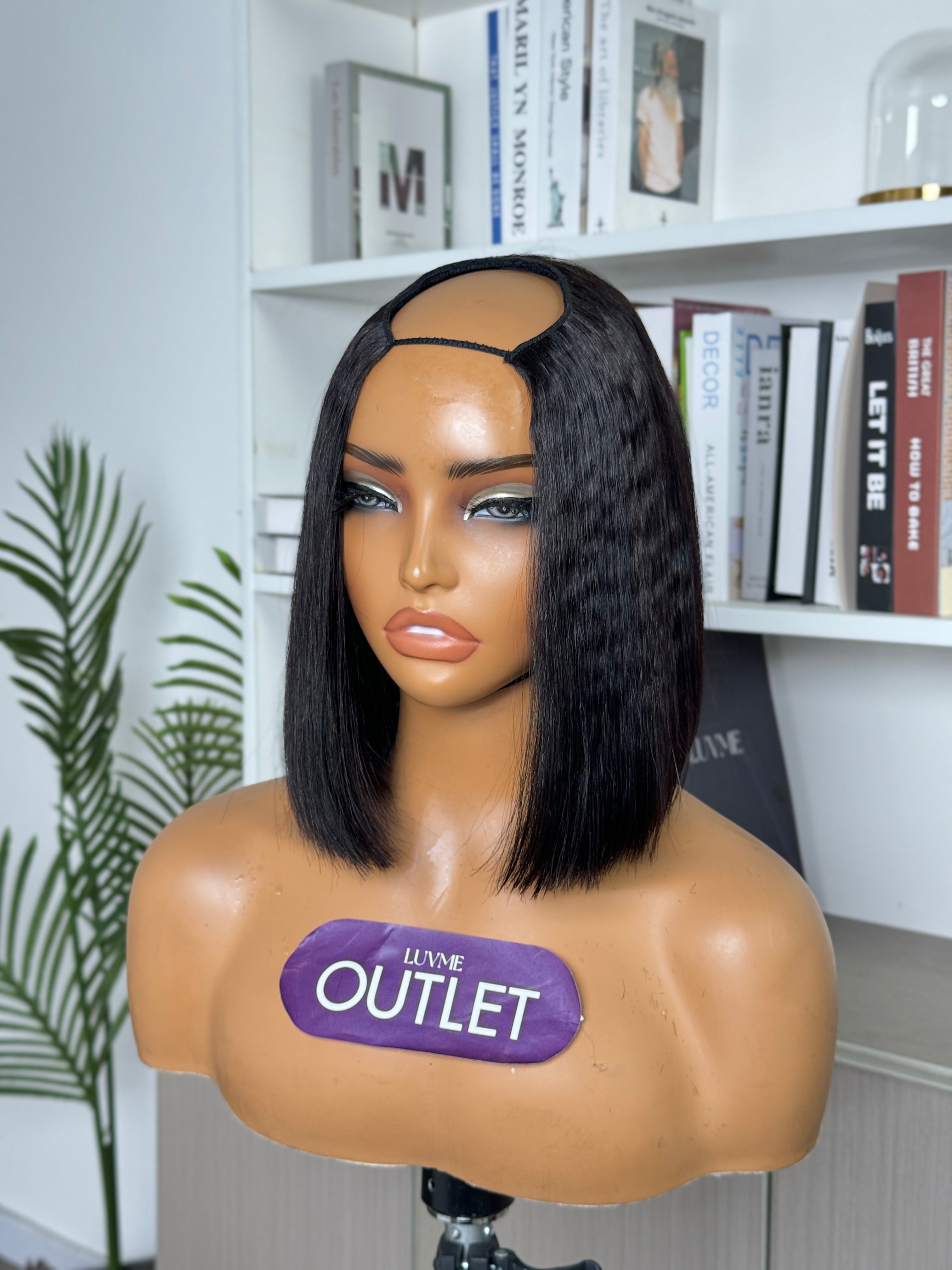 Natural black glueless U part bob wig made of 100% human hair by Luvme Hair, showing the wig's style and realistic texture.