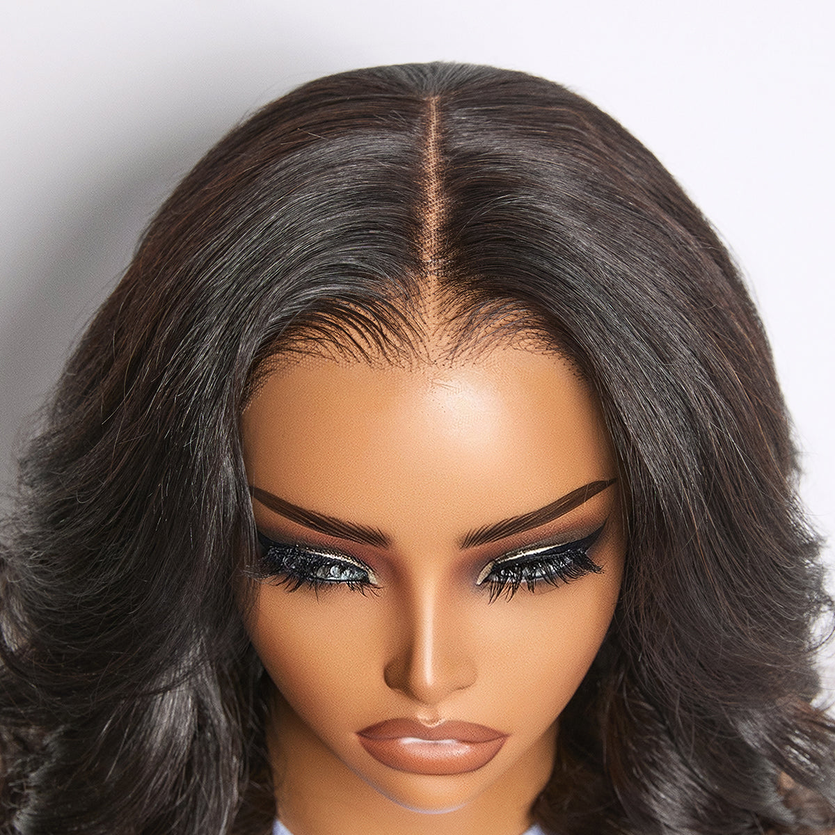 Luvme All-Day Curl Hold™ shoulder length body wave HD lace wig with pre-cut lace, natural parting, and glueless cap.