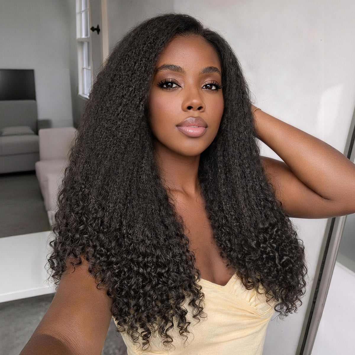 Luvme All-Day Comfort HD lace wig featuring natural black kinky straight to curly hair with 7x6 closure, glueless and pre-cut lace.
