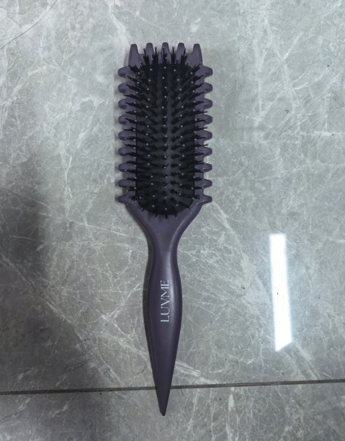 Luvme Hair Curved Curl Repair Comb smoothing messy curls and restoring their shape with a sleek design.