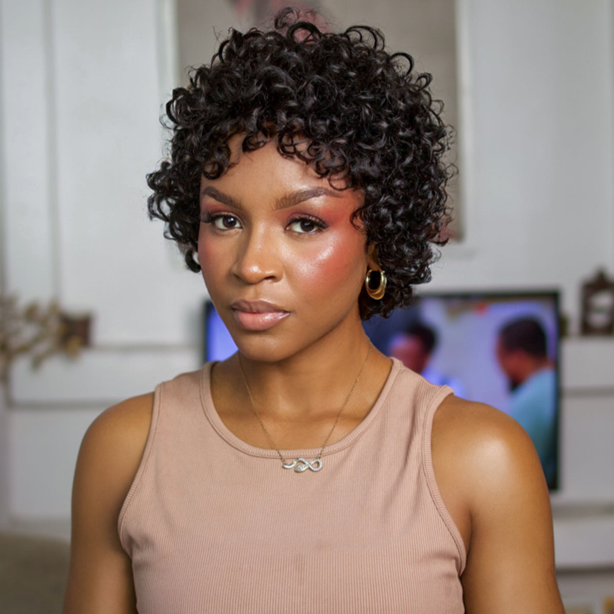 Luvme 10-inch brown loose wave and 6-inch natural black big curly glueless lace wigs, minimalist and stylish for versatile looks.