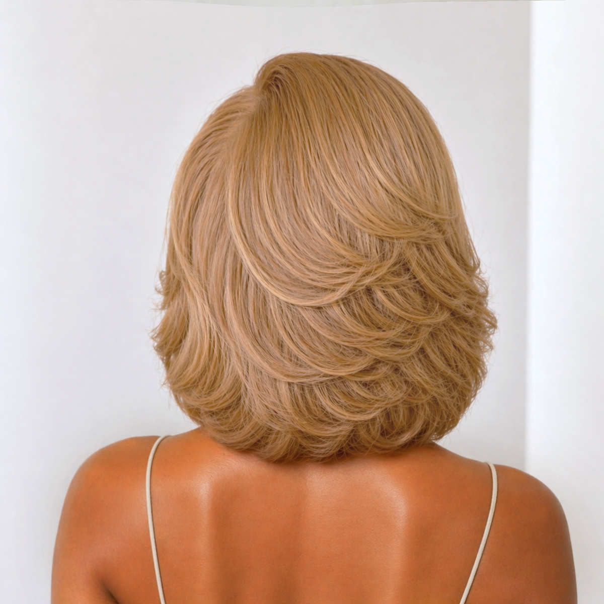 Ash blonde ombre layered lace bob wig with 5x5 closure, glueless design, from Luvme Hair, shown on a mannequin.