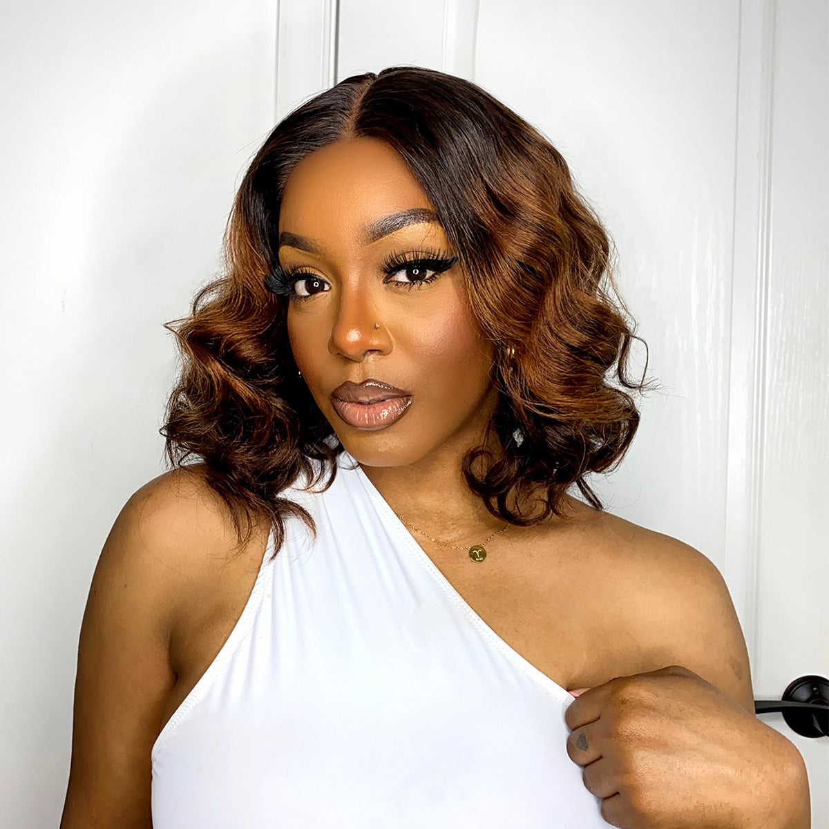 Luvme 10-inch brown ombre loose wave HD lace wig and 12-inch wet and wavy water wave 4x4 closure lace wig on a mannequin head.