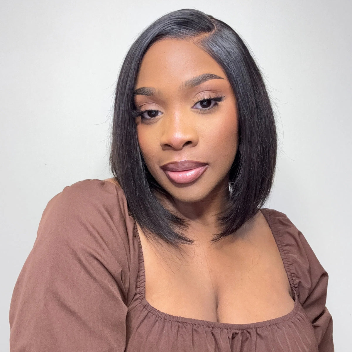 Luvme VIP ONLY Super Natural C Part black glueless lace bob wig made of 100% human hair, showcasing its natural hairline and style.