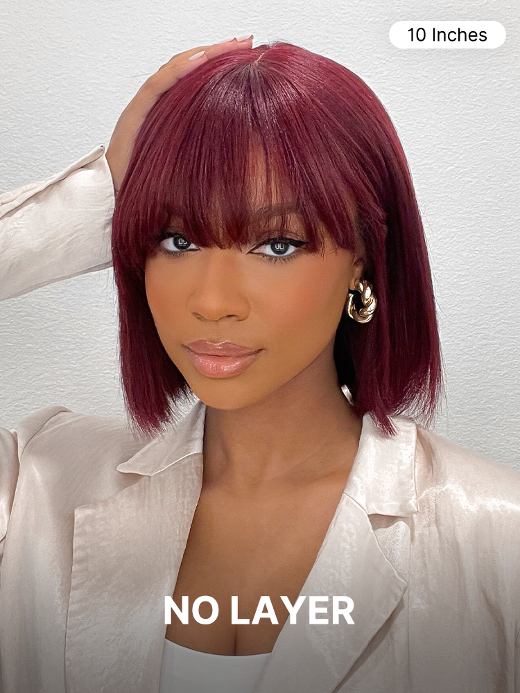 Reddish purple Luvme glueless Yaki straight bob wig with bangs, minimalist lace cap, all-day comfort, realistic hair texture.