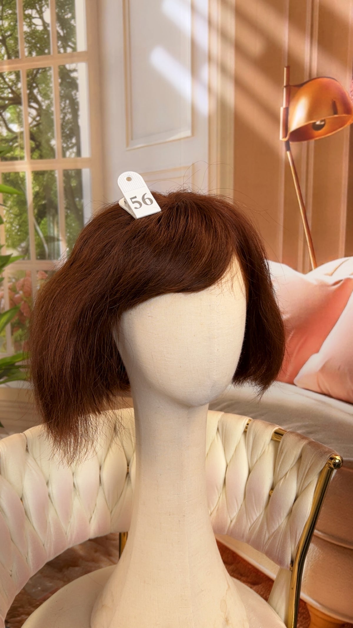 Luvme Hair outlet wig displayed in natural black, styled with waves and shoulder-length for a trendy, versatile look.