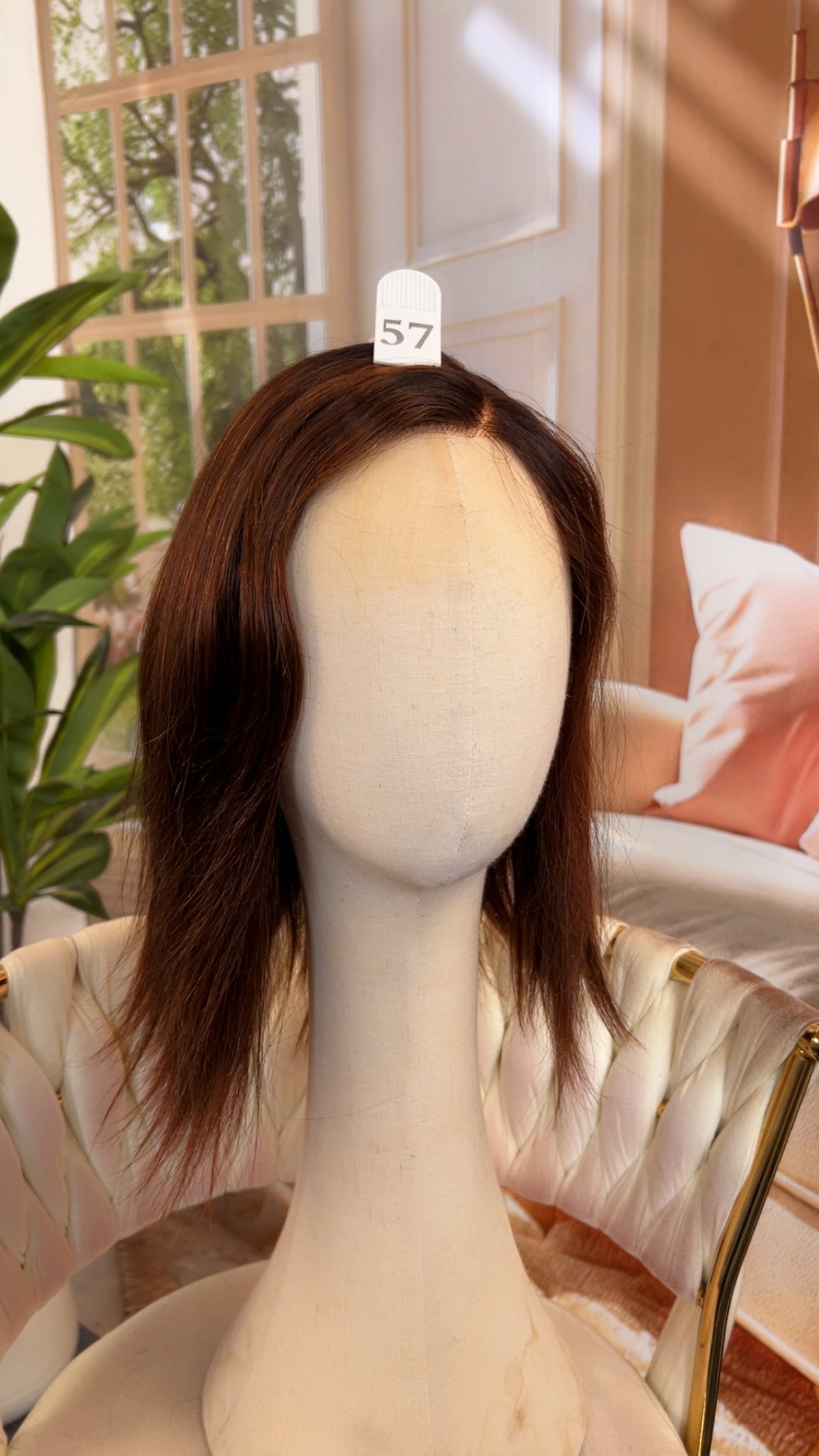 Luvme Hair live outlet wig in natural black, styled with soft waves, showcasing realistic hair texture and full cap design.
