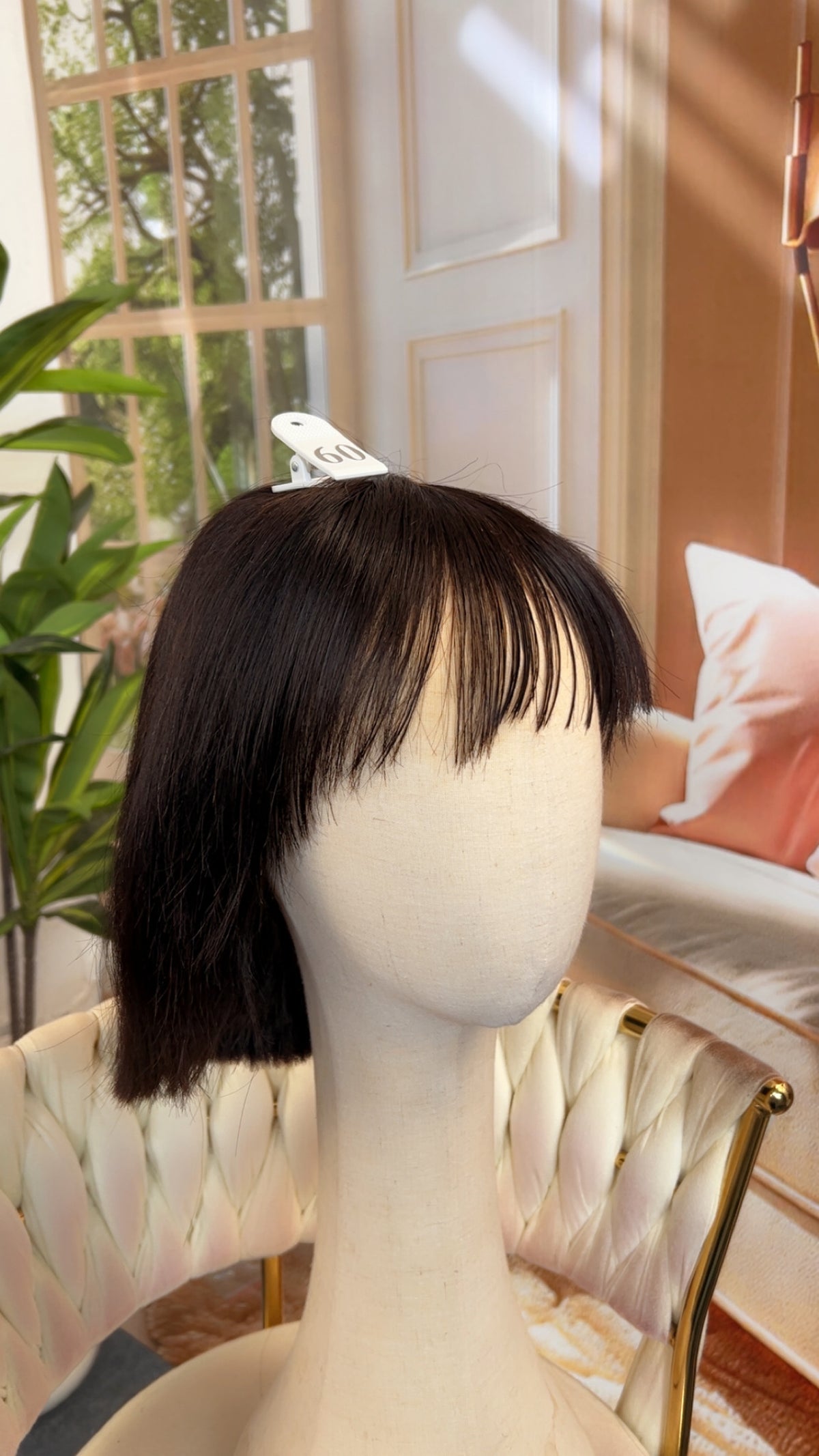 Luvme Hair live outlet wig in a natural style, showcasing the textured, full-bodied curly hair on a mannequin head.