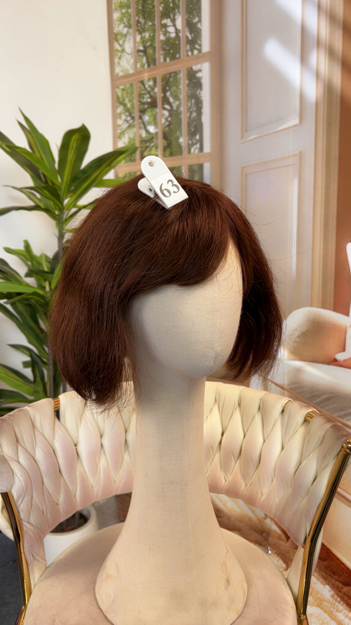 Luvme Hair outlet wig in styled black, long and wavy, showcasing natural hair texture and layered cut.