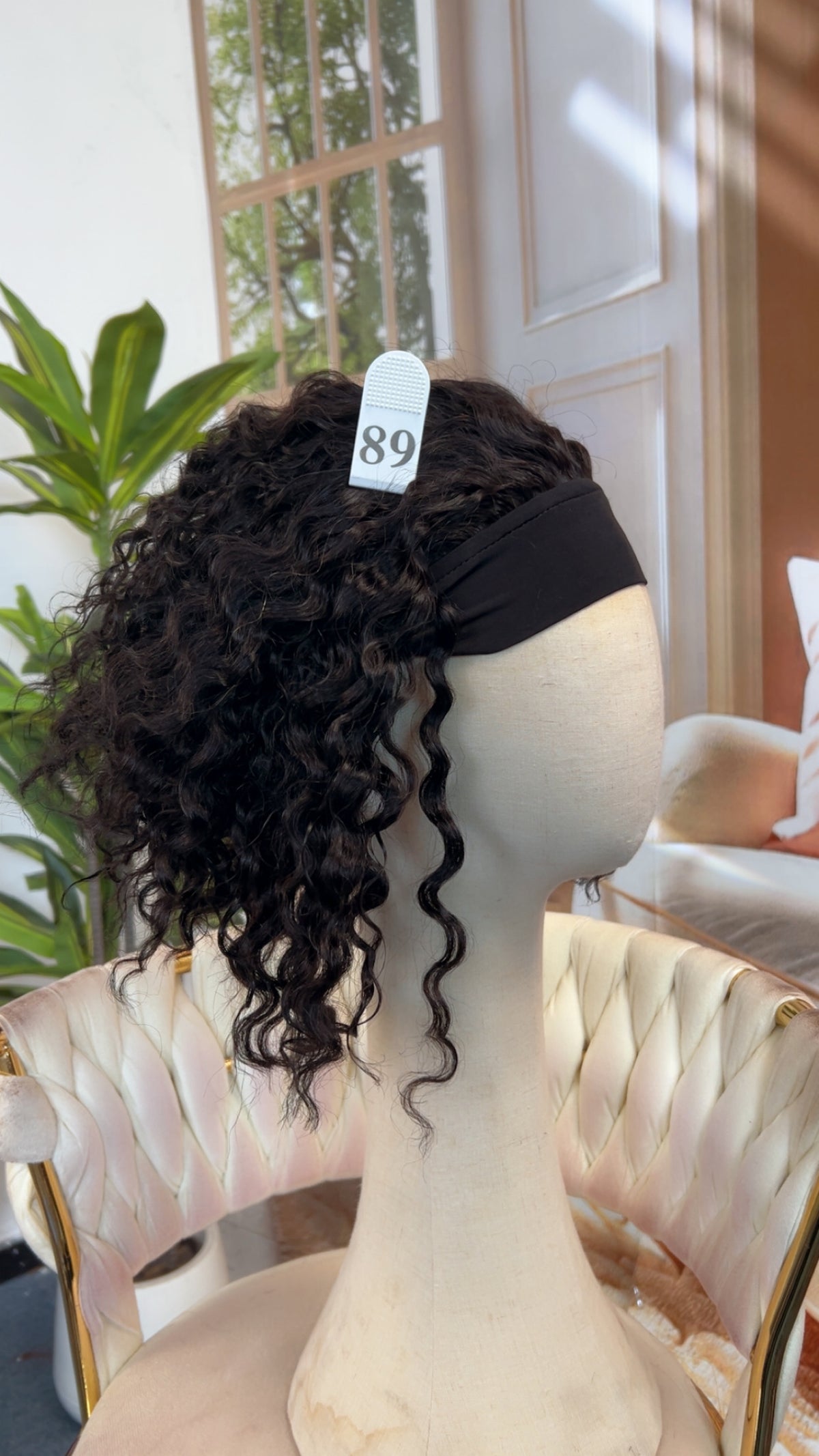 Luvme Hair live outlet wig in a natural black style, showcasing long, wavy synthetic hair with a lace front for a seamless look.