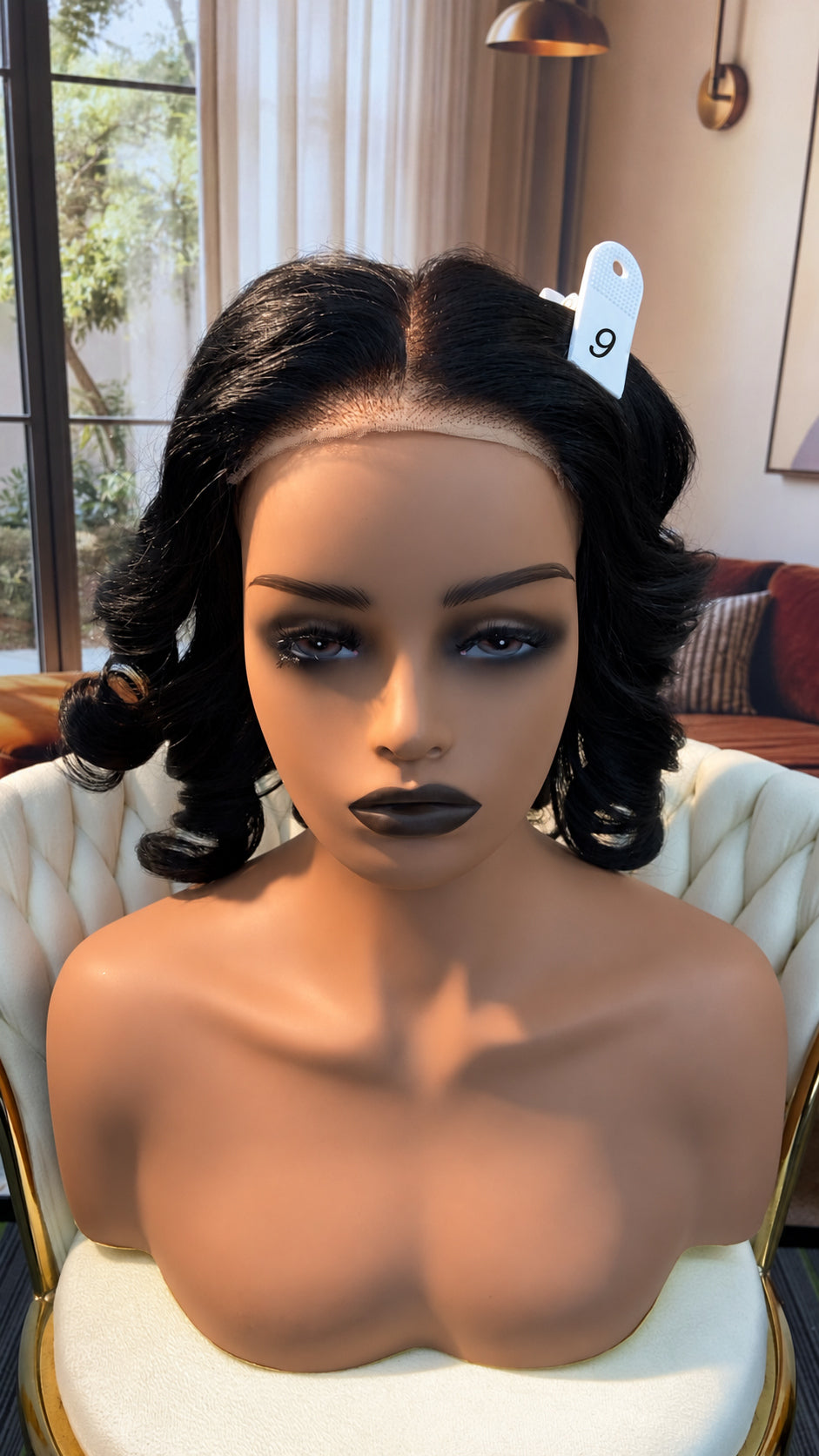 Luvme Hair live outlet wig displayed on a mannequin with styled brown hair and a natural wave pattern.