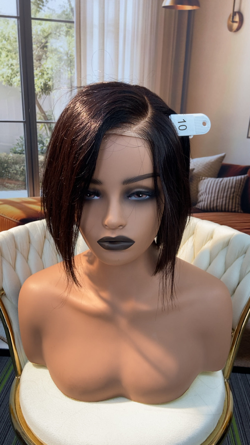 Luvme Hair live outlet wig displayed on a mannequin, showcasing its length, color, and style for a natural look.