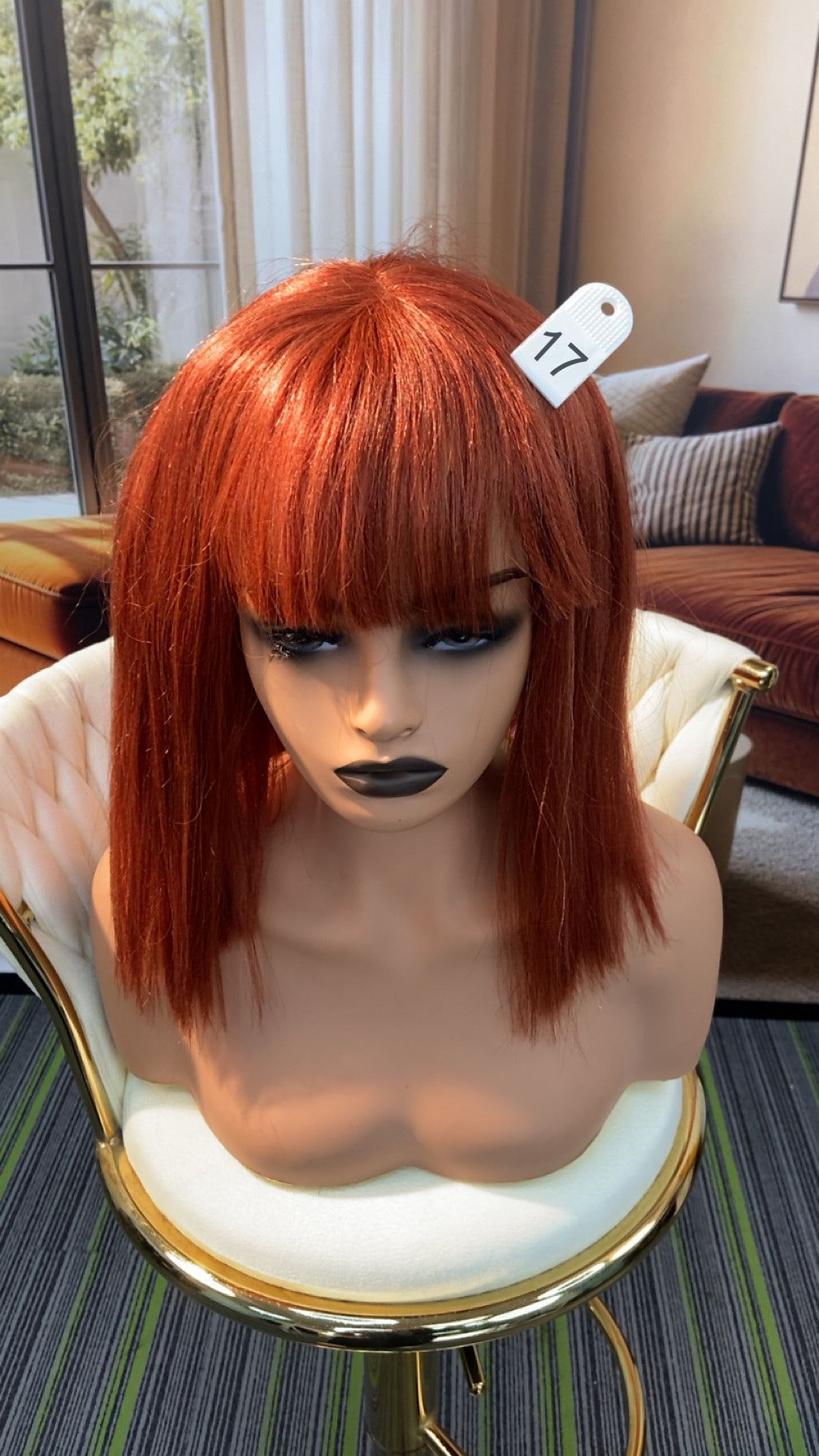 Luvme Hair live outlet wig in natural black, styled with loose waves, showcasing a full head of long, silky synthetic hair.