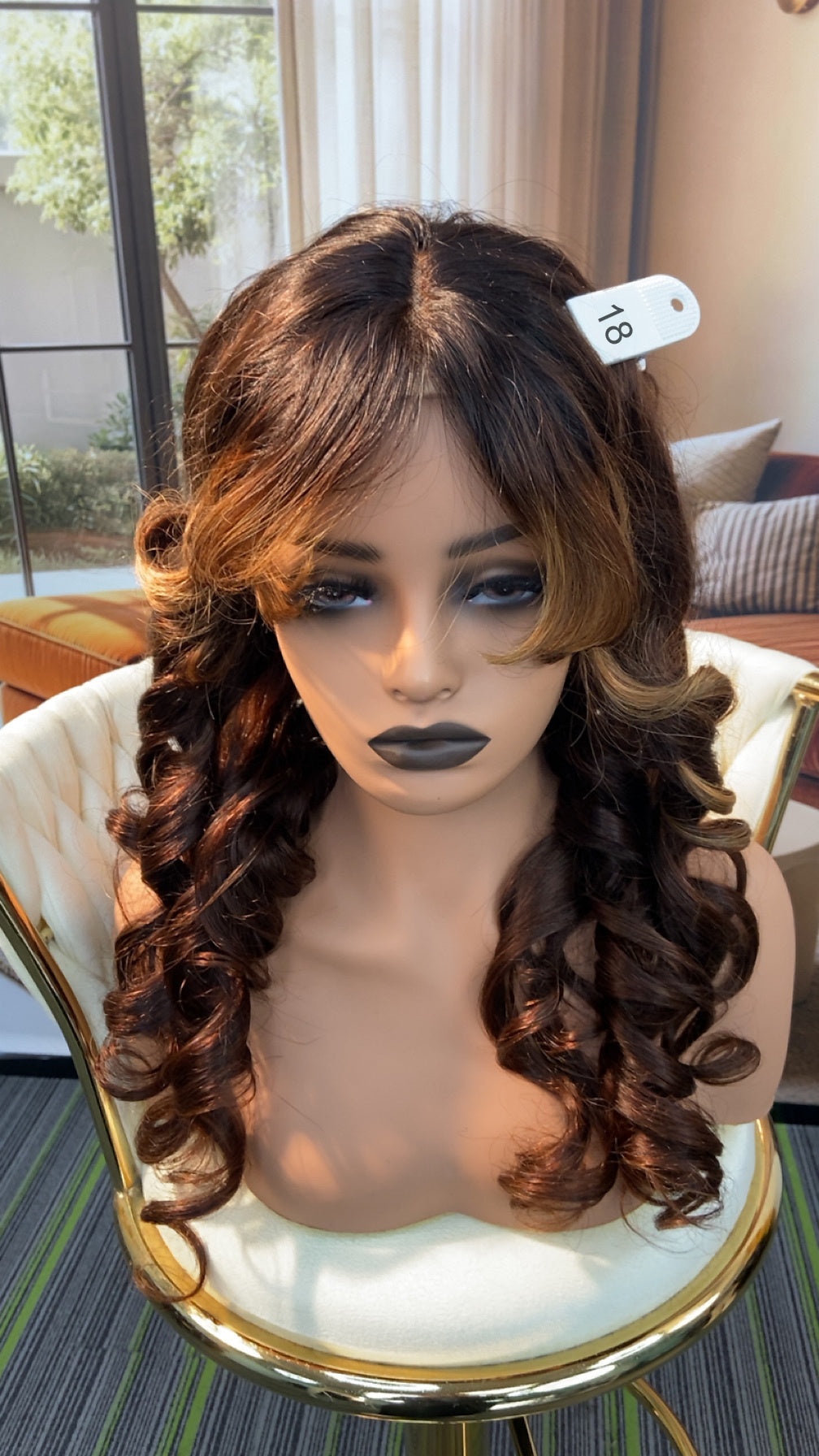 Luvme Hair live outlet wig in various styles, showcasing the textured, natural-looking hair with full cap and wavy curls.