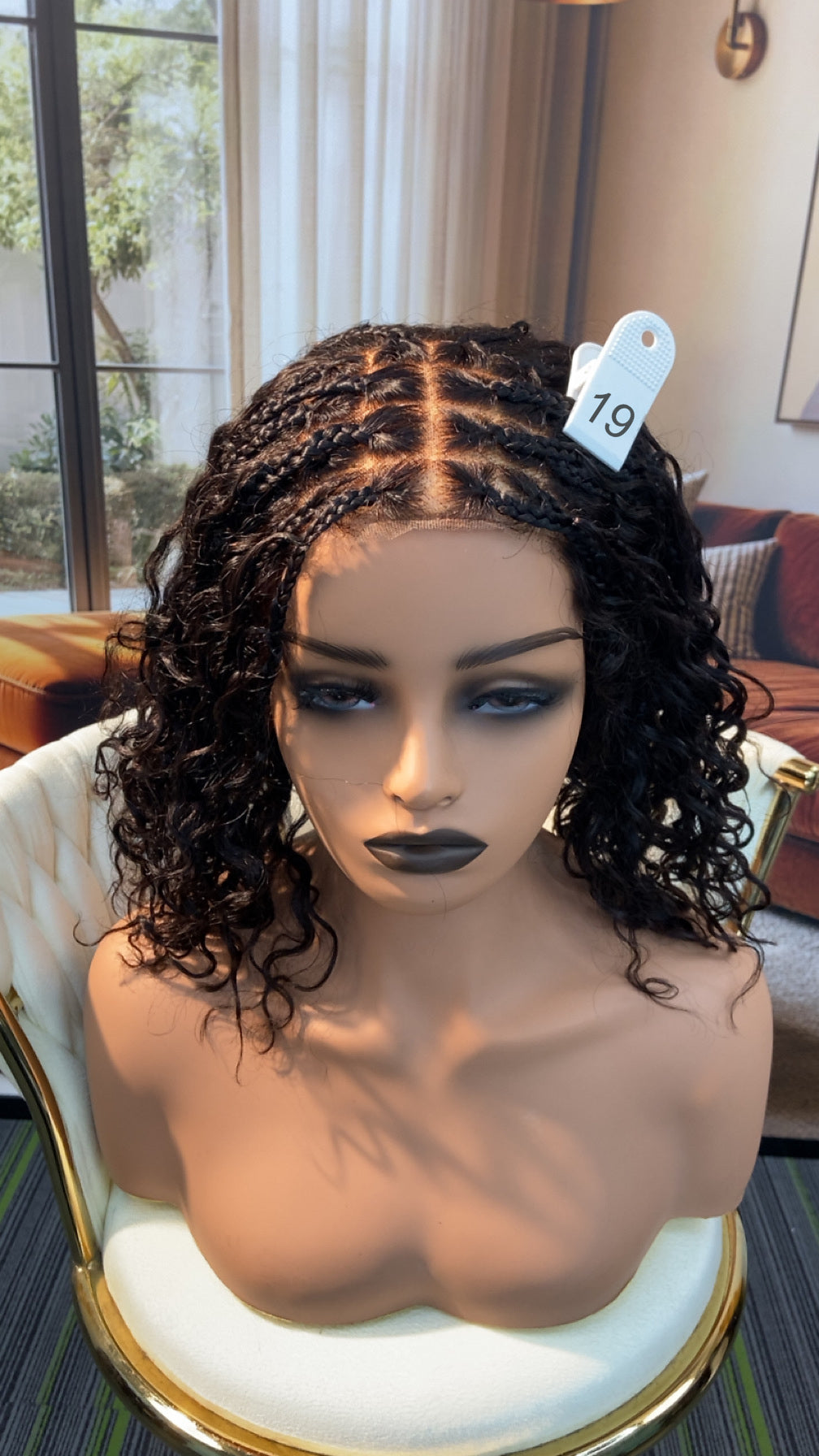 Luvme Hair live outlet wig displayed on a mannequin, showcasing the style and texture of the synthetic or human hair wig.