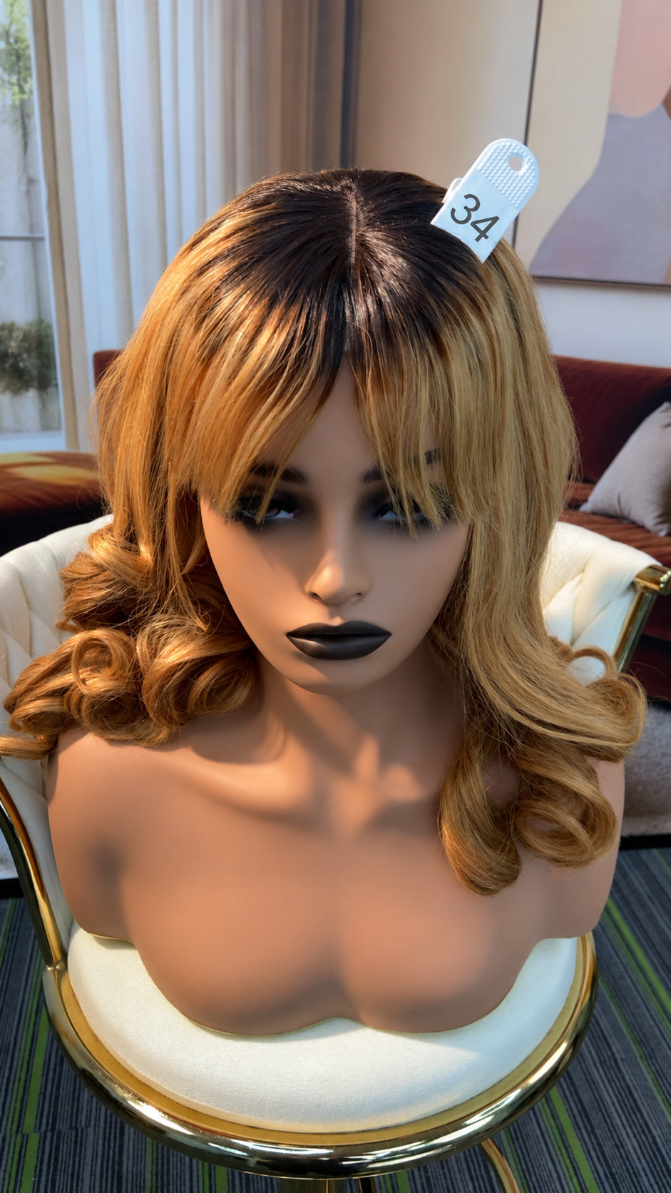 Luvme Hair outlet wig in natural black, styled with soft waves, showcasing a full lace construction and shoulder-length cut.