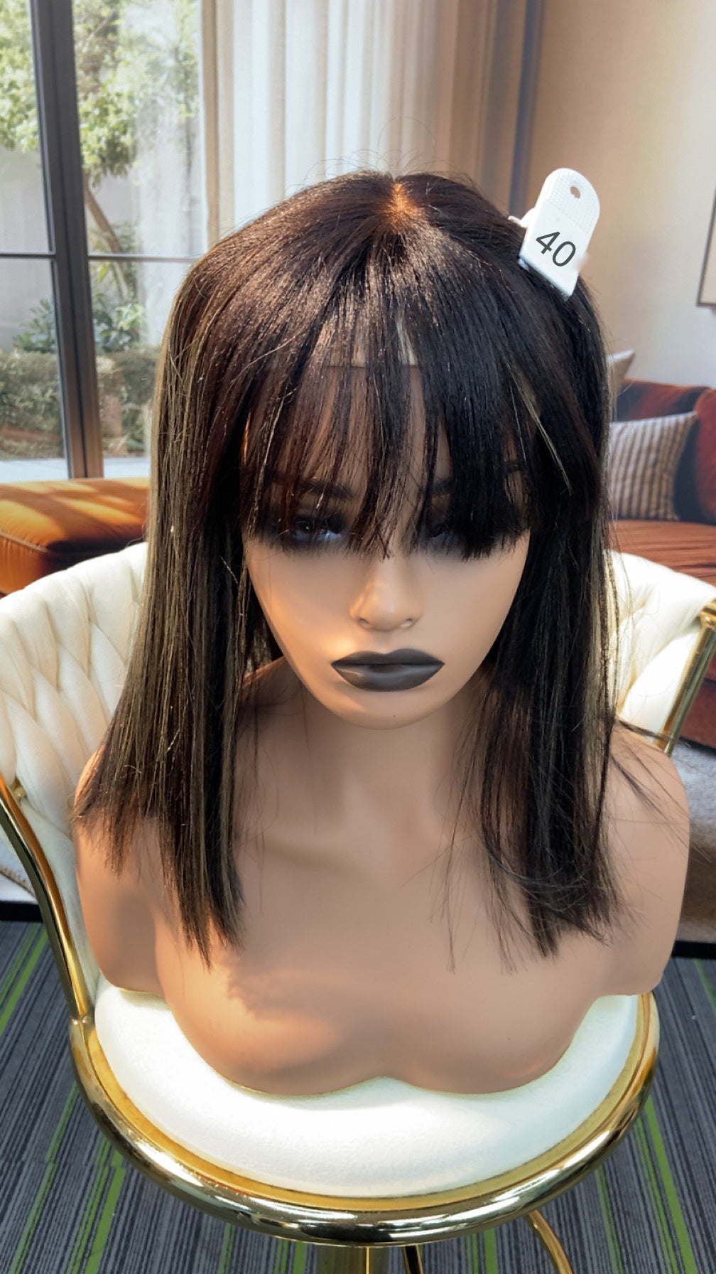 Luvme Hair live outlet wig displayed in natural hair style with dark brown color and layered cut, showcasing product details.