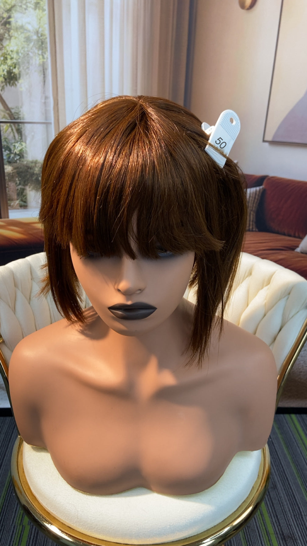 Luvme Hair live outlet wig in natural black, showing the wig's length, curls, and lace front for a realistic look.