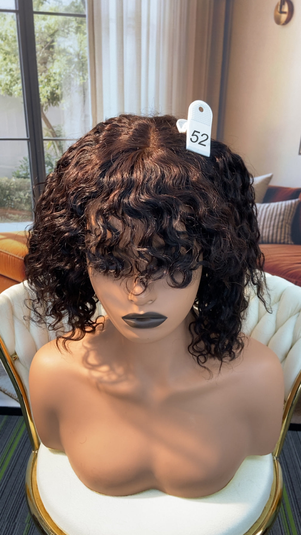 Luvme Hair live outlet wig displayed on a mannequin, showcasing a stylish, natural-looking wig with dark brown color and layered cut.