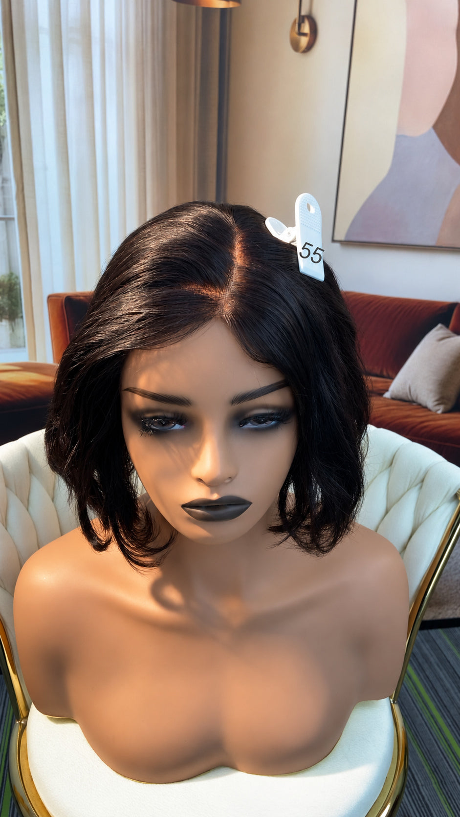 Luvme Hair live outlet wig displayed on a model, showcasing the stylish wig with natural waves and a full hairline.
