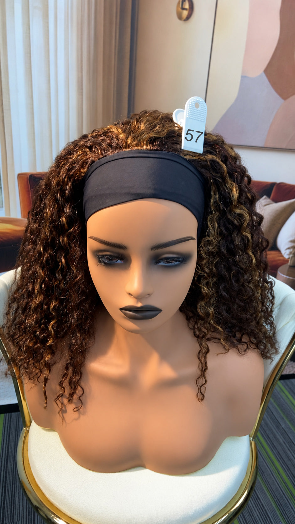 Luvme Hair live outlet wig display showing various styles with 50% off, only one per style available.