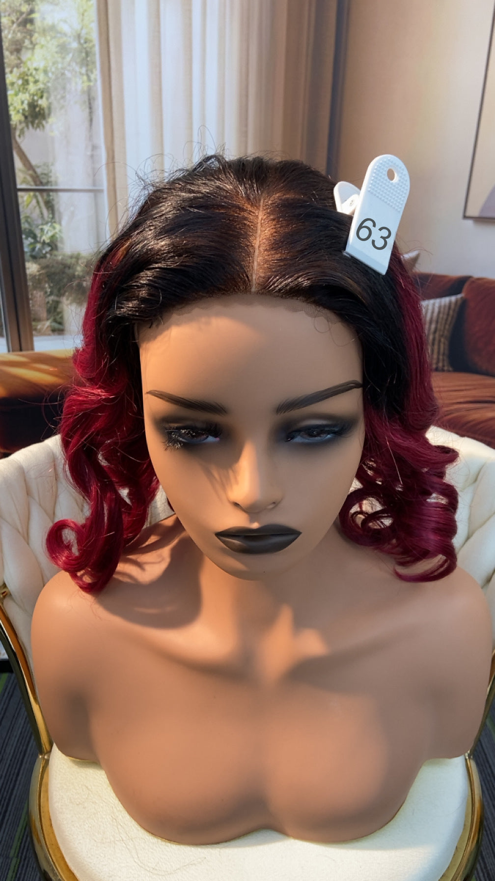 Luvme Hair live outlet wig with natural black straight style, showcasing the hair's texture and length.