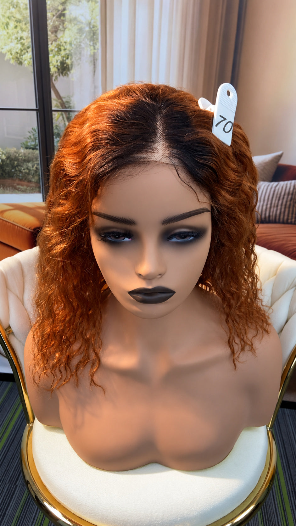 Luvme Hair live outlet wig in natural black, styled with layered waves, displayed on a mannequin head.