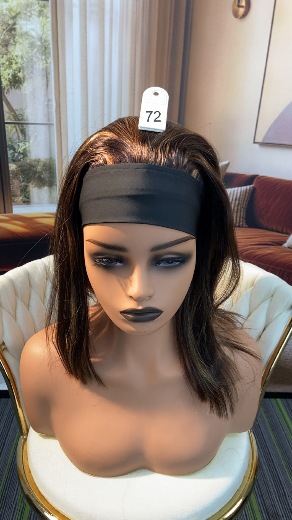 Luvme Hair live outlet wig, 50% off, showcasing a stylish, natural-looking wig with wavy black hair on a mannequin head.