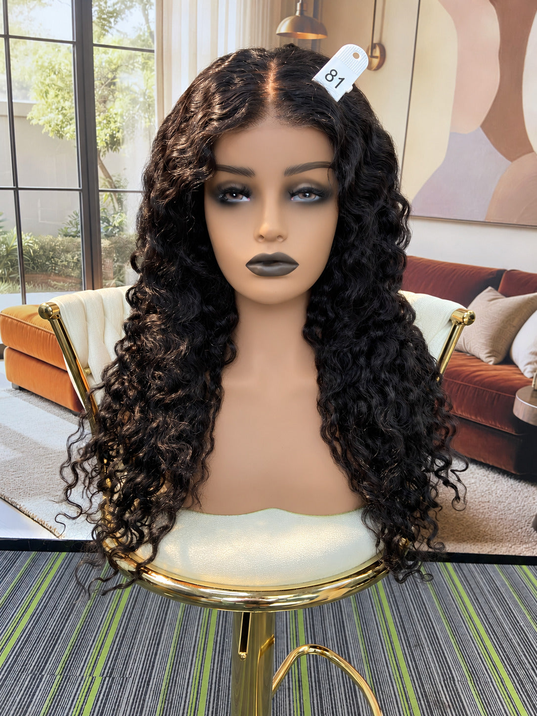 Luvme Hair outlet wig with natural-style hair in various lengths, displayed on a mannequin head.