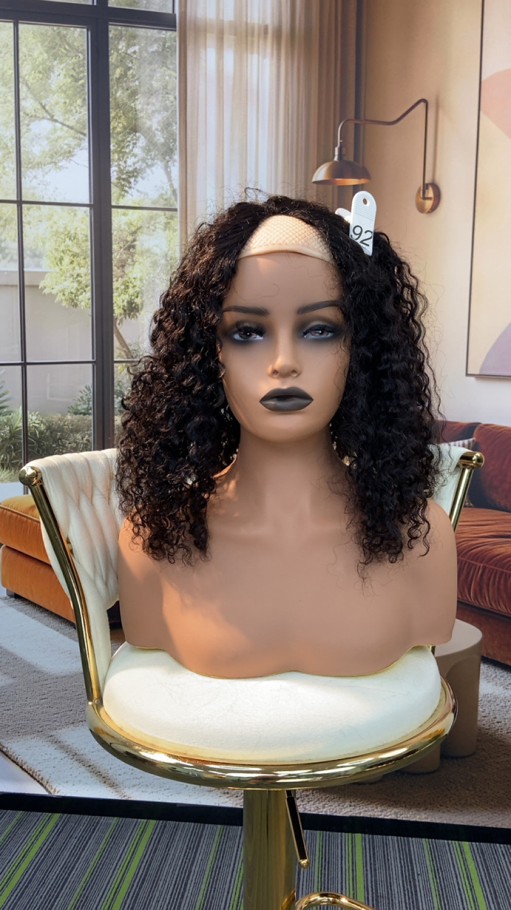 Luvme Hair live outlet wig displayed on a mannequin, showcasing its natural straight hair style and realistic texture.