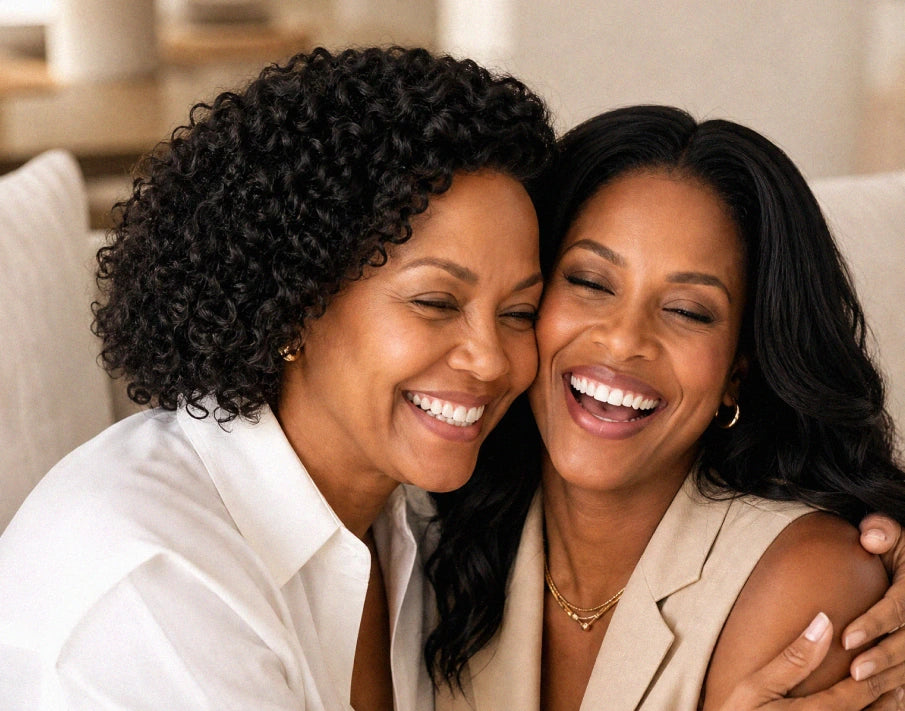 Two women laughing together
