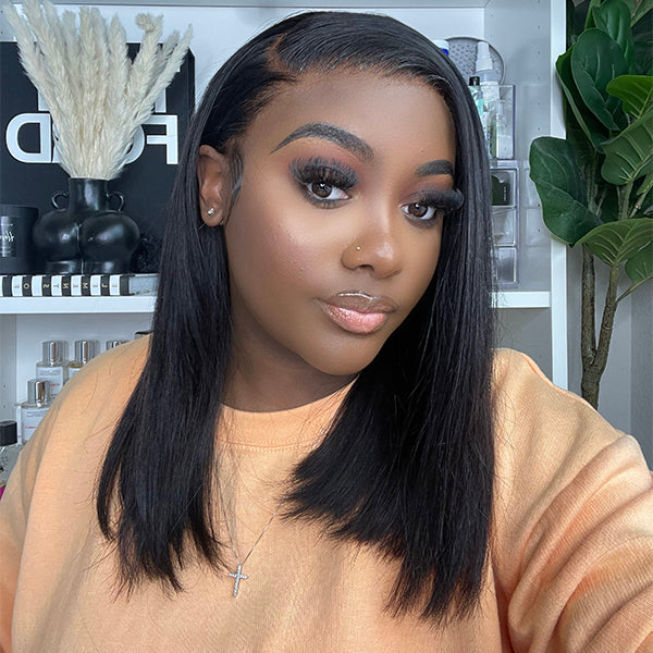 Luvme invisible lace 13x4 frontal wig with straight bob style, middle part, showcasing natural-looking lace front and sleek hair strands.
